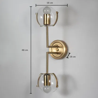 Gold metal wall light with 45 cm height 14.5 cm width and 18 cm depth for luxury modern decor spaces.