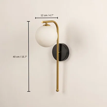 Gold and black wall sconce with a frosted globe shade, 40 x 12 x 12 cm (15.7 x 4.7 x 4.7 inches) dimensions