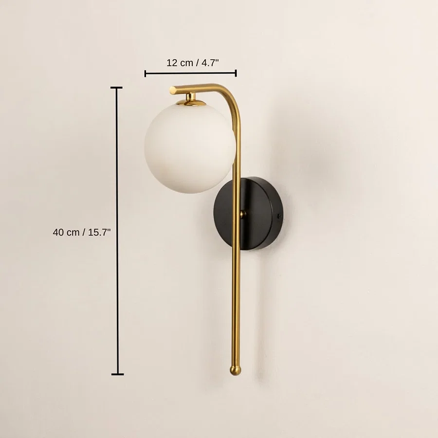 Gold and black wall sconce with a frosted globe shade, 40 x 12 x 12 cm (15.7 x 4.7 x 4.7 inches) dimensions