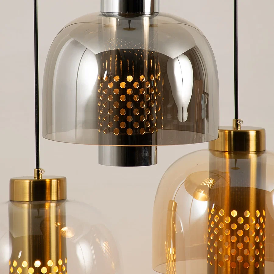 Smoke glass pendant light closeup showcasing tinted glass finish and refined contemporary lighting craftsmanship details.