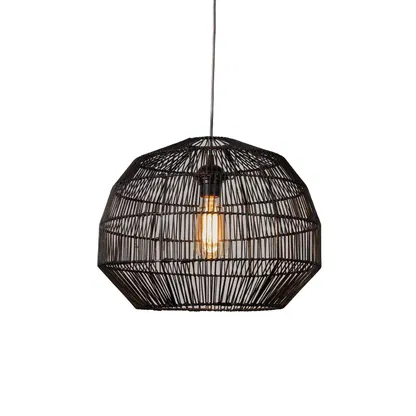 Black metal pendant light with faceted geometric cage form and glowing bulb hanging against minimal neutral wall background for stylish modern decor.