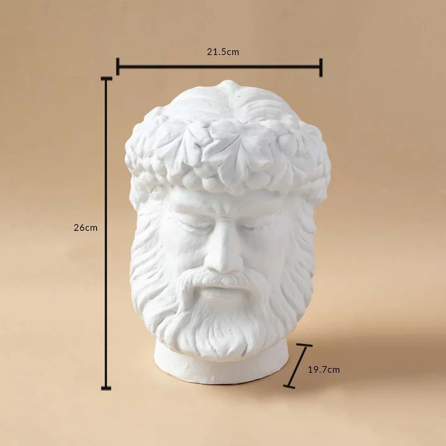 White sculpted head décor piece in a front view measuring 21 cm width and 27 cm height ideal for artistic décor styling and pedestal display.