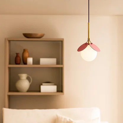 Pink and white glass pendant light adding playful charm to modern bedroom and living room interiors.