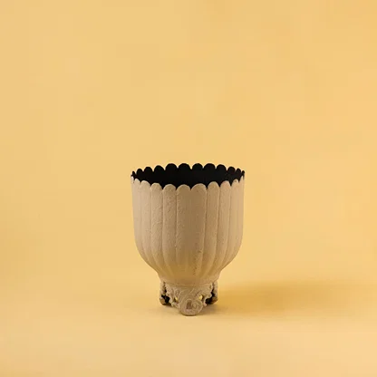 Cream metal scalloped planter decor on a clean white background highlighting its elegant textured finish for home styling.
