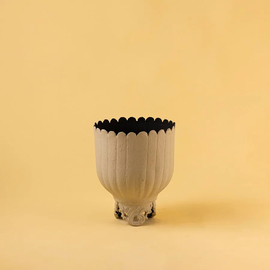 Cream metal scalloped planter decor on a clean white background highlighting its elegant textured finish for home styling.