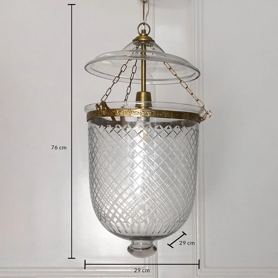 Dimension image of clear diamond cut glass and antique brass pendant light showing 70 cm height and 23 cm width.