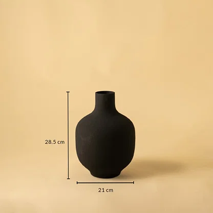 Black textured metal vase shown with 28.5 cm height and 21 cm width offering a clear accurate size reference.