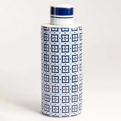 Blue ceramic decorative storage jar with geometric print and matching lid for contemporary tabletop styling and decor.