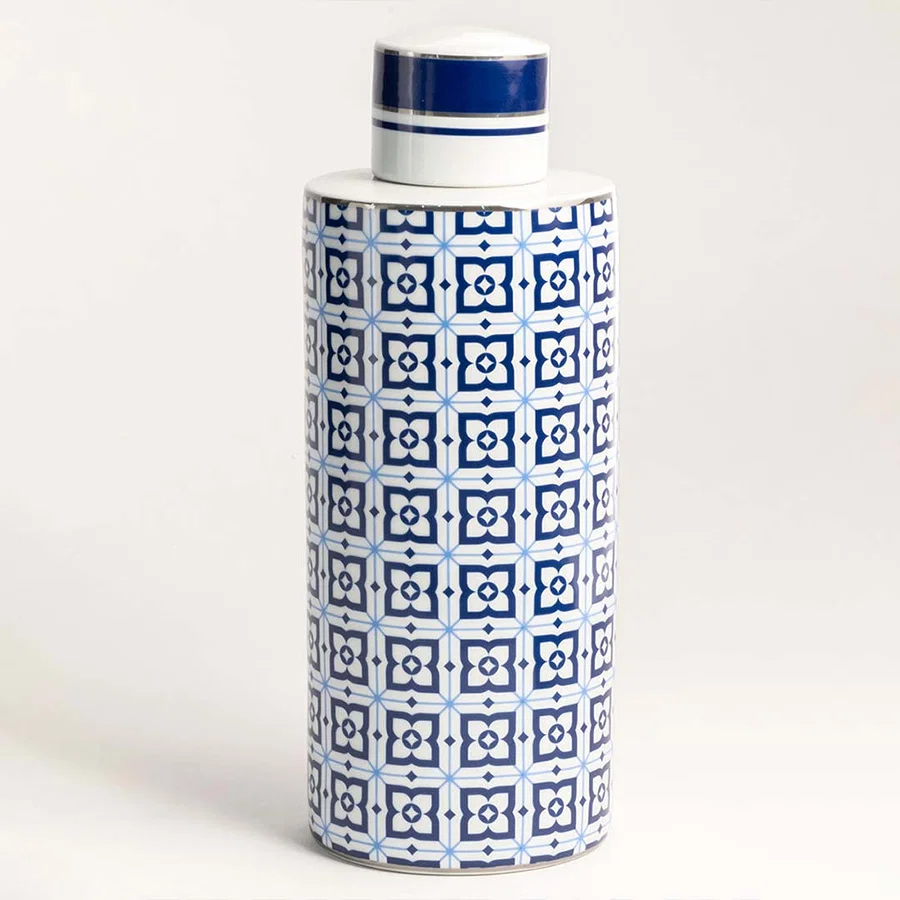 Blue ceramic decorative storage jar with geometric print and matching lid for contemporary tabletop styling and decor.