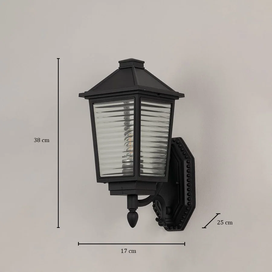 Traditional black outdoor wall lantern with ribbed glass measuring 38cm height 17cm width and 25cm projection bracket specifications.