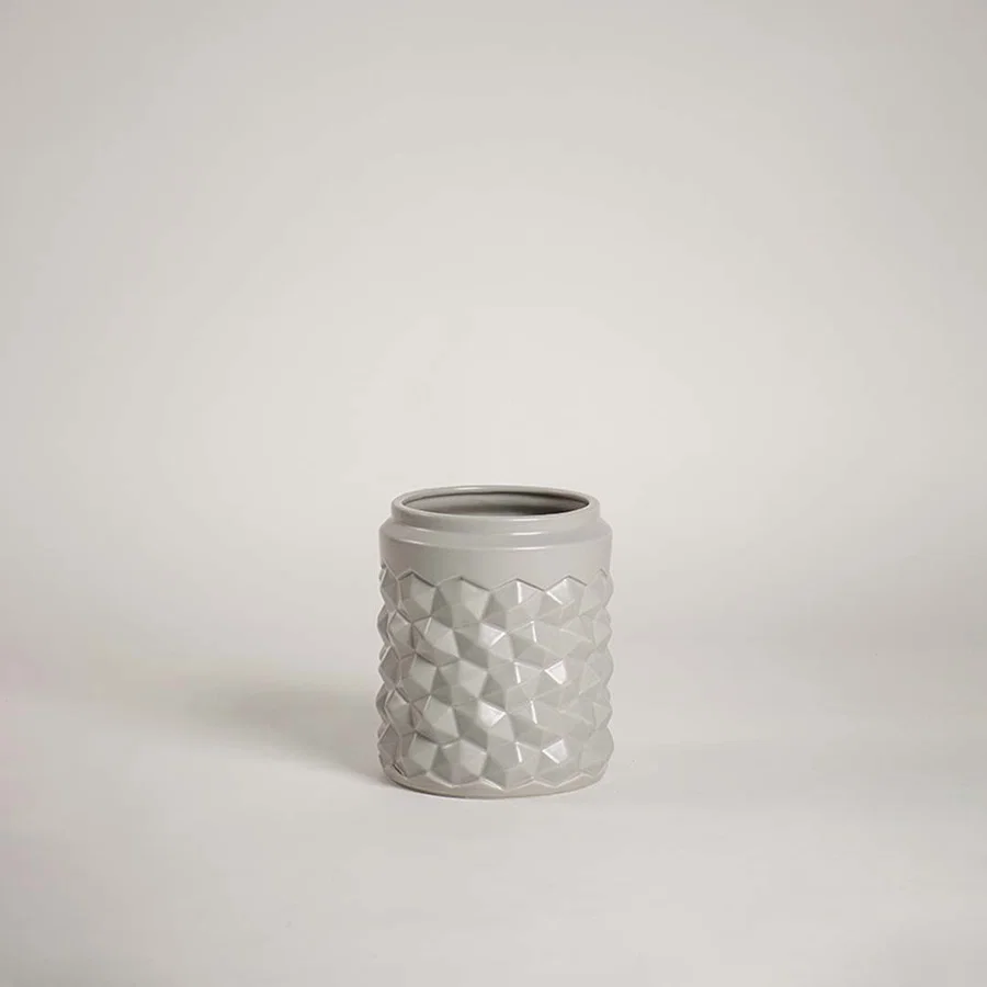 Grey ceramic decorative vase with raised bubble detailing for tabletop styling and modern home decor displays.