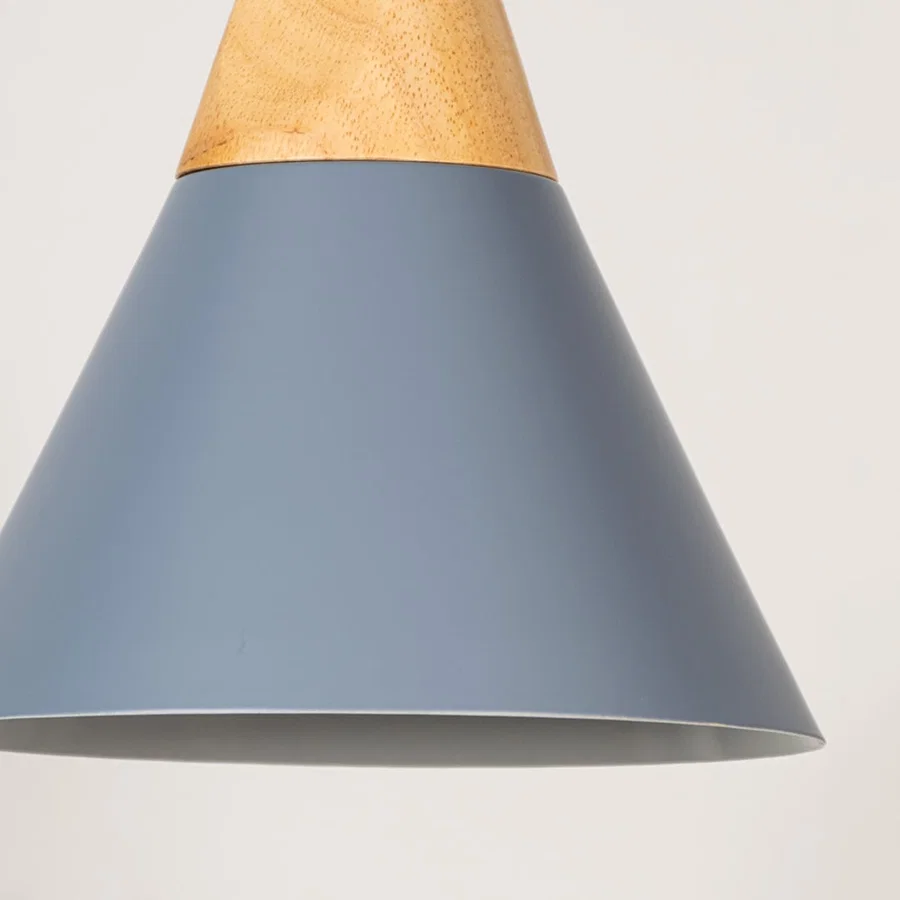 Blue metal pendant light with natural wood detailing showcasing wide cone shape and modern Scandinavian style.