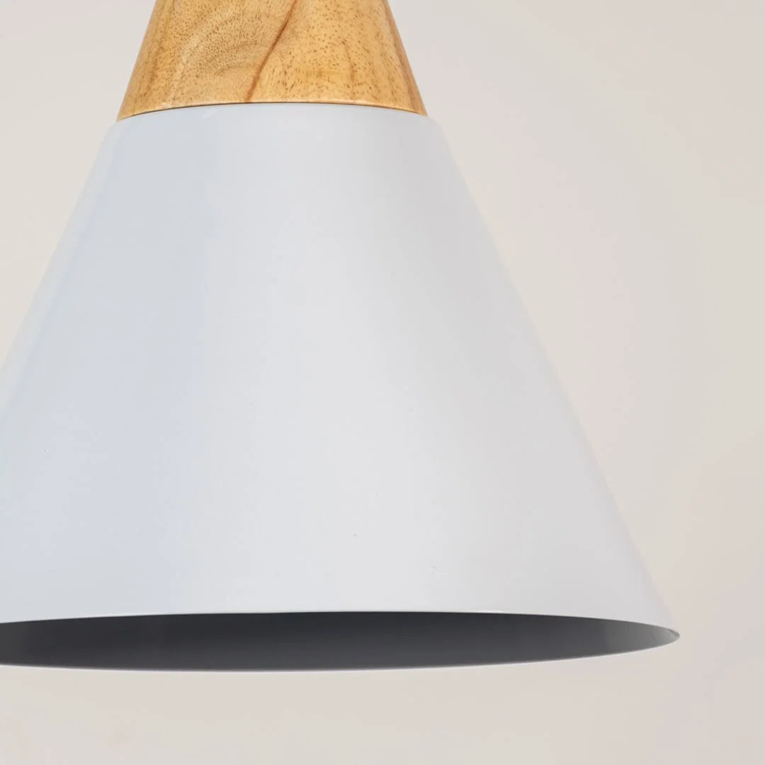 White metal pendant light with natural wood detailing showcasing wide cone shape and modern Scandinavian style.