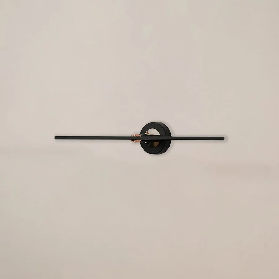 Black and gold metal picture light with sleek linear design for artwork mirror and decorative wall lighting.
