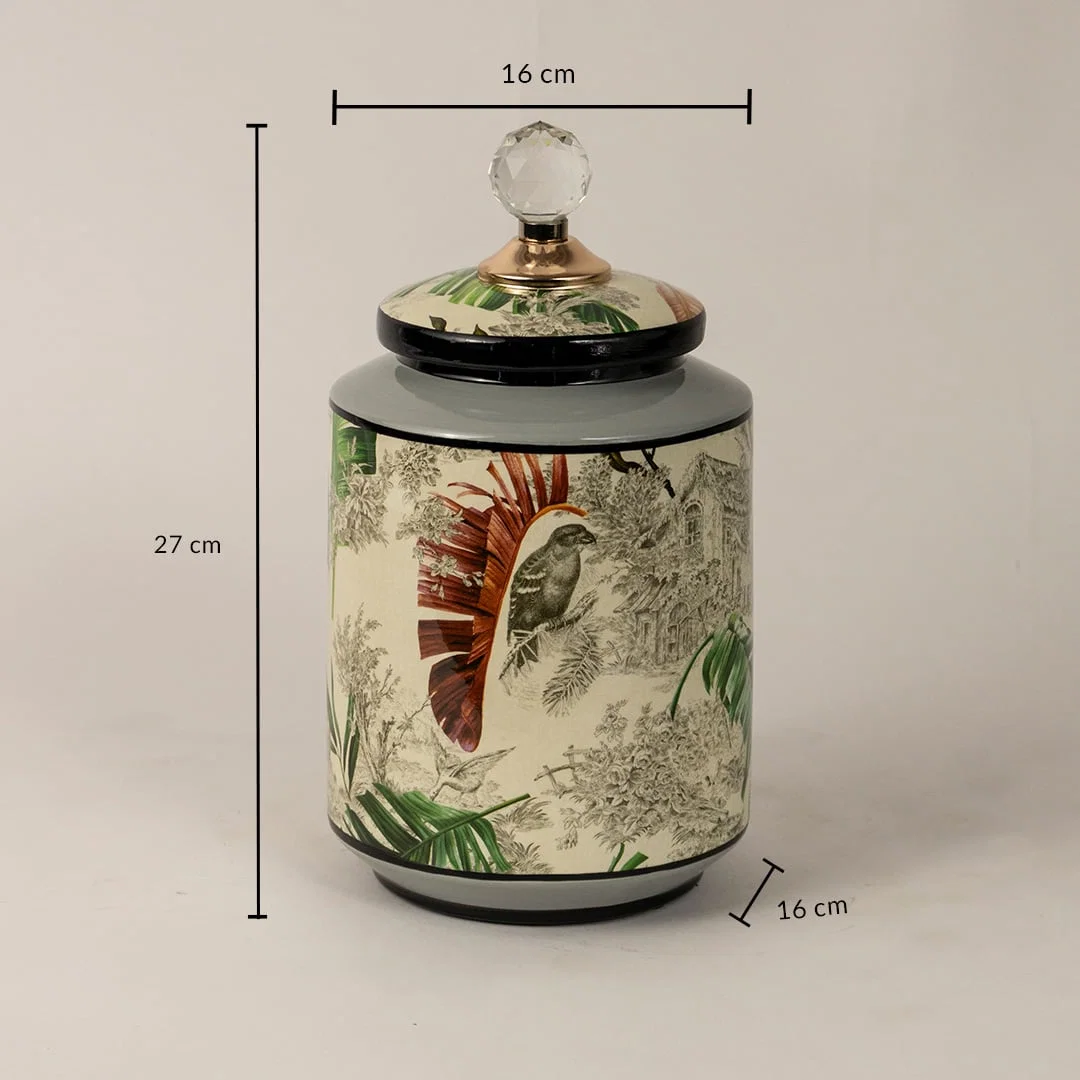 Tropical bird jar measuring 27 cm in height and 16 cm in diameter featuring bird and foliage design.