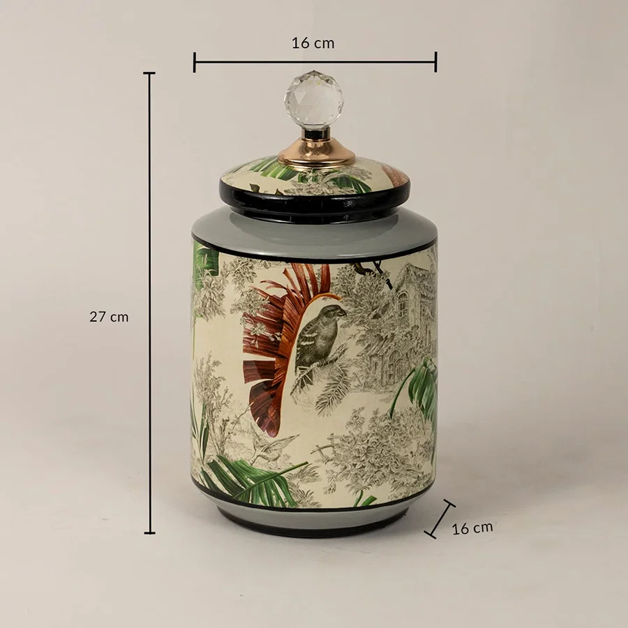 Tropical bird jar measuring 27 cm in height and 16 cm in diameter featuring bird and foliage design.