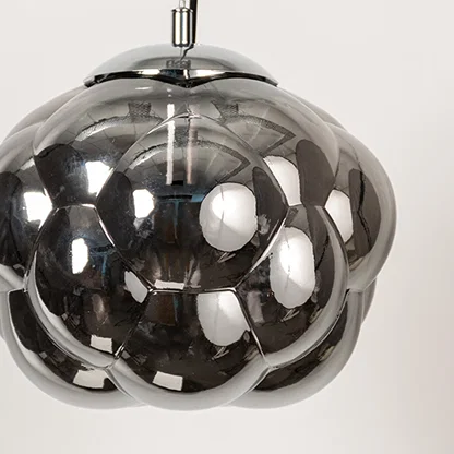 Smoked glass bubble pendant light featuring glossy sculpted glass texture and contemporary design for luxury interior decor.