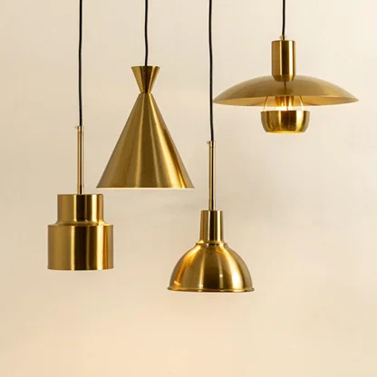 Modern gold metal pendant lights for elegant kitchen island and dining room decor inspiration styling.