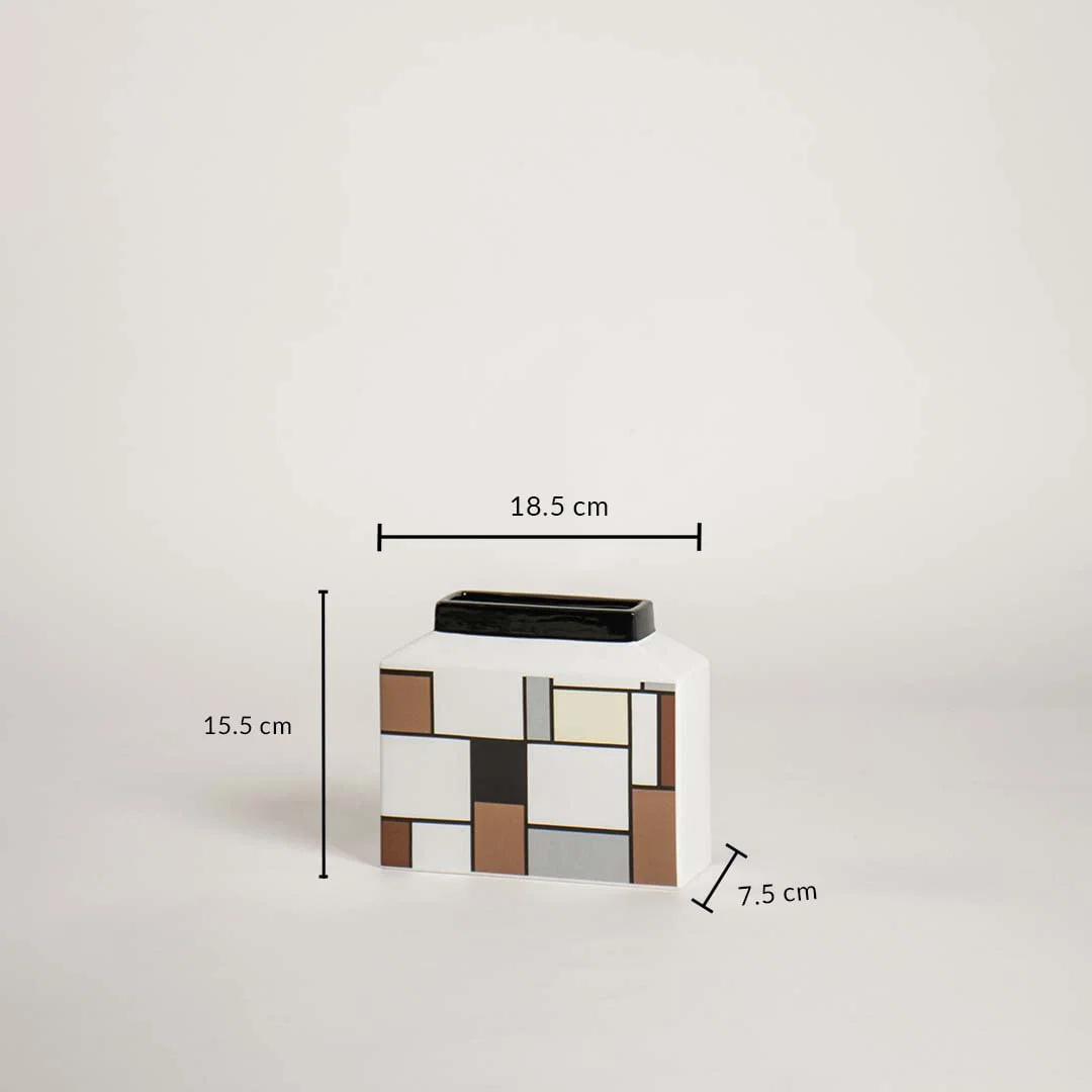 Geometric ceramic vase shown with dimensions 15.5 cm height 18.5 cm width and 7.5 cm depth clearly displaying product size.