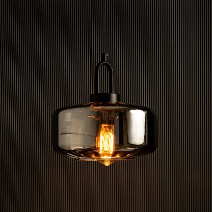 Smoky grey glass pendant light with warm LED illumination perfect for modern home lighting and interior decor enhancing contemporary ceiling lamp design.