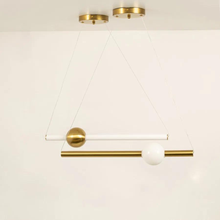 Gold metal linear pendant light displaying sleek suspended design and contemporary decorative ceiling lighting style.