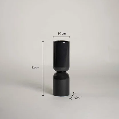 Black ceramic vase with 32 cm height and 10 cm width shown clearly for accurate interior decor size reference and planning.