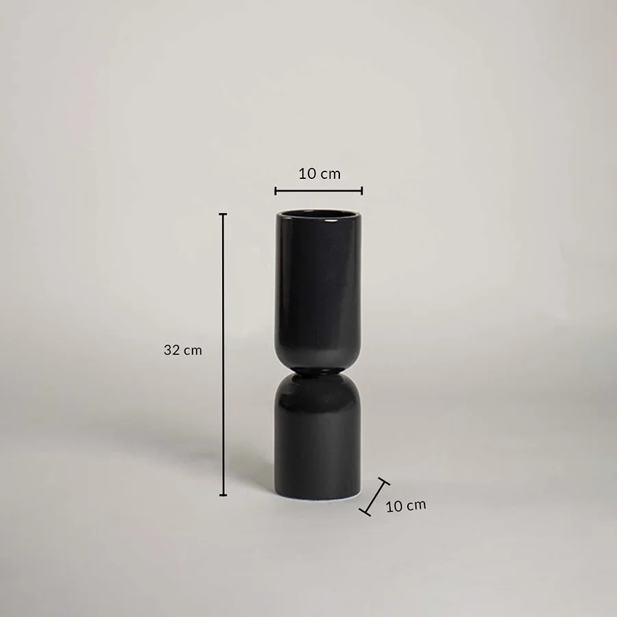 Black ceramic vase with 32 cm height and 10 cm width shown clearly for accurate interior decor size reference and planning.