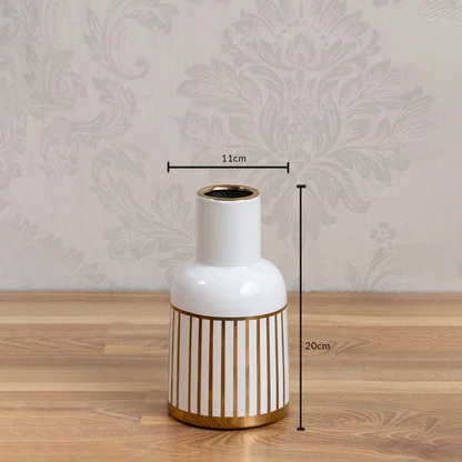 A white ceramic vase with gold stripes shown with measurements of 20 cm height and 11 cm width clearly presenting its compact decorative size.