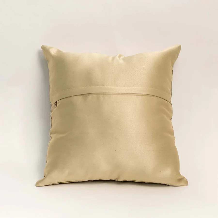 Rear view of floral cushion with solid beige backing highlighting minimal look durable fabric and neat tailored edges.