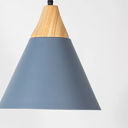 Blue metal pendant light with natural wood detailing showcasing wide cone shape and modern Scandinavian style.
