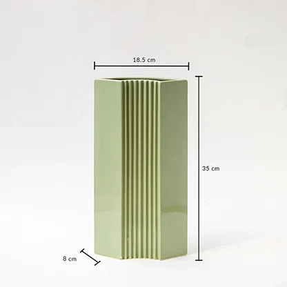 Green modern vase shown with dimensions 35 cm height 18.5 cm width and 8 cm depth highlighting its tall slim structure and ribbed detailing for accurate size reference.