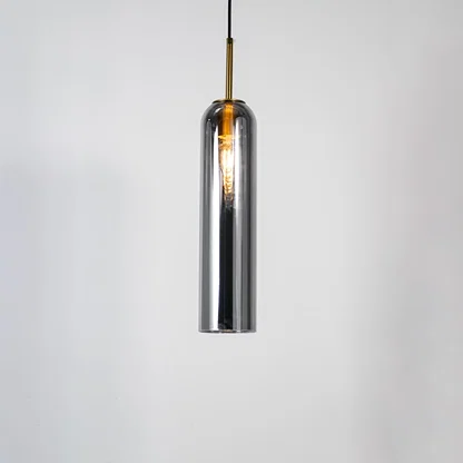 Chrome metal pendant light with sleek cylindrical design and reflective finish for contemporary ceiling lighting decor.