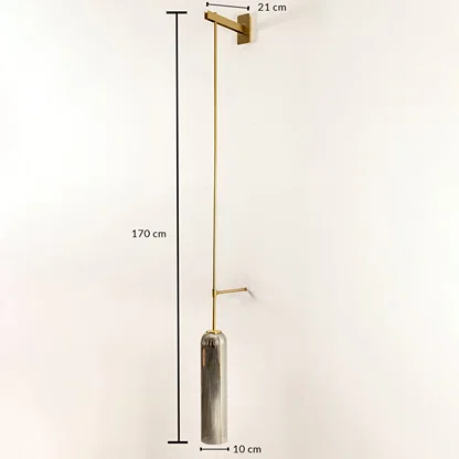 Wall pendant light shown with 170 cm height and 10 cm shade width featuring long metal arm and smoked glass cylinder ideal for modern vertical interior home decor lighting.