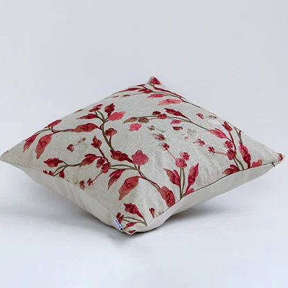 Side view of floral cushion showing thickness soft filling and stitched edges designed for sofa chair or bed decor use.