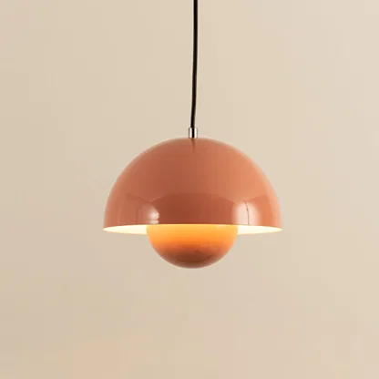 Peach metal pendant light with layered shade and smooth finish crafted for stylish interiors.