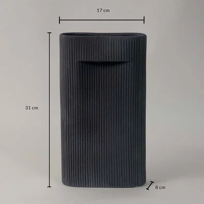 Tall black ribbed ceramic vase shown with 31 cm height and 17 cm width perfect for modern living room and office table decor.