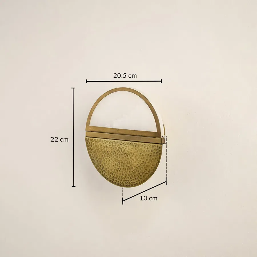Gold metal wall light with 22 cm height 20.5 cm width and 10 cm depth for modern decor styling spaces.