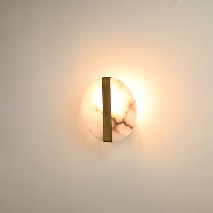 Modern marble wall light with warm ambient glow for stylish hallway and premium decor styling spaces.

