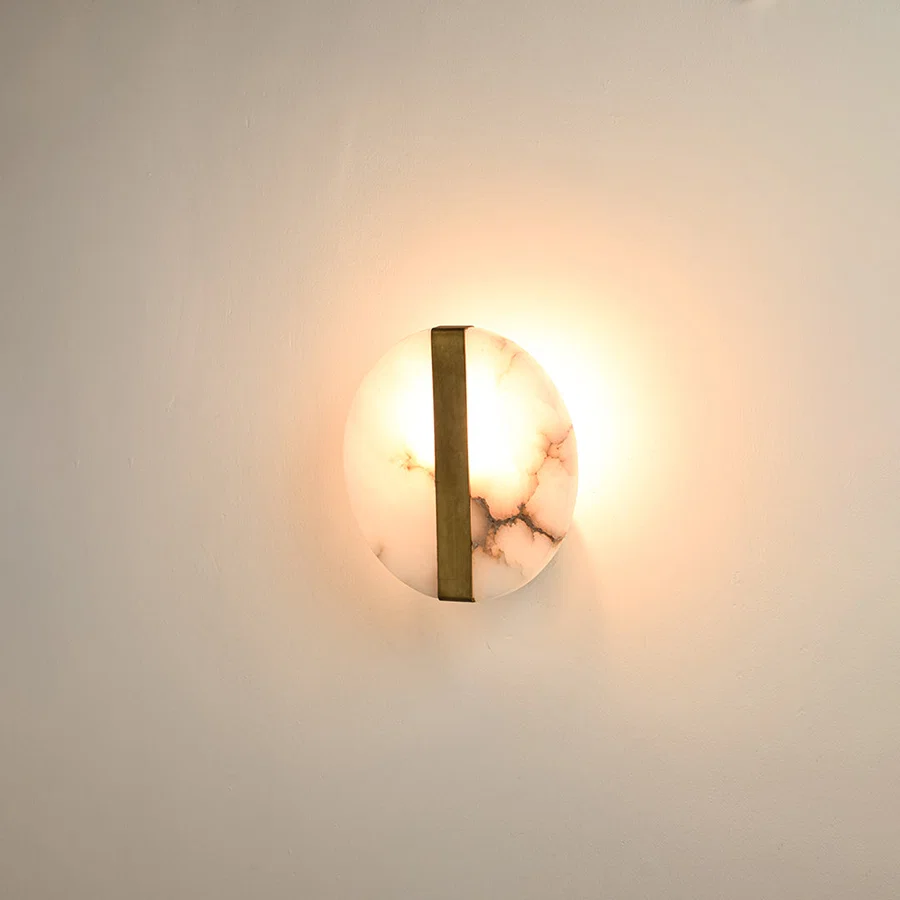 Modern marble wall light with warm ambient glow for stylish hallway and premium decor styling spaces.

