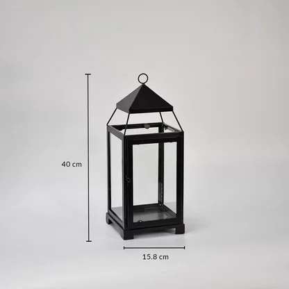 Black metal lantern showing 42 cm height 18 cm width and 18 cm depth dimensions suitable for floor tabletop or porch decor placement.