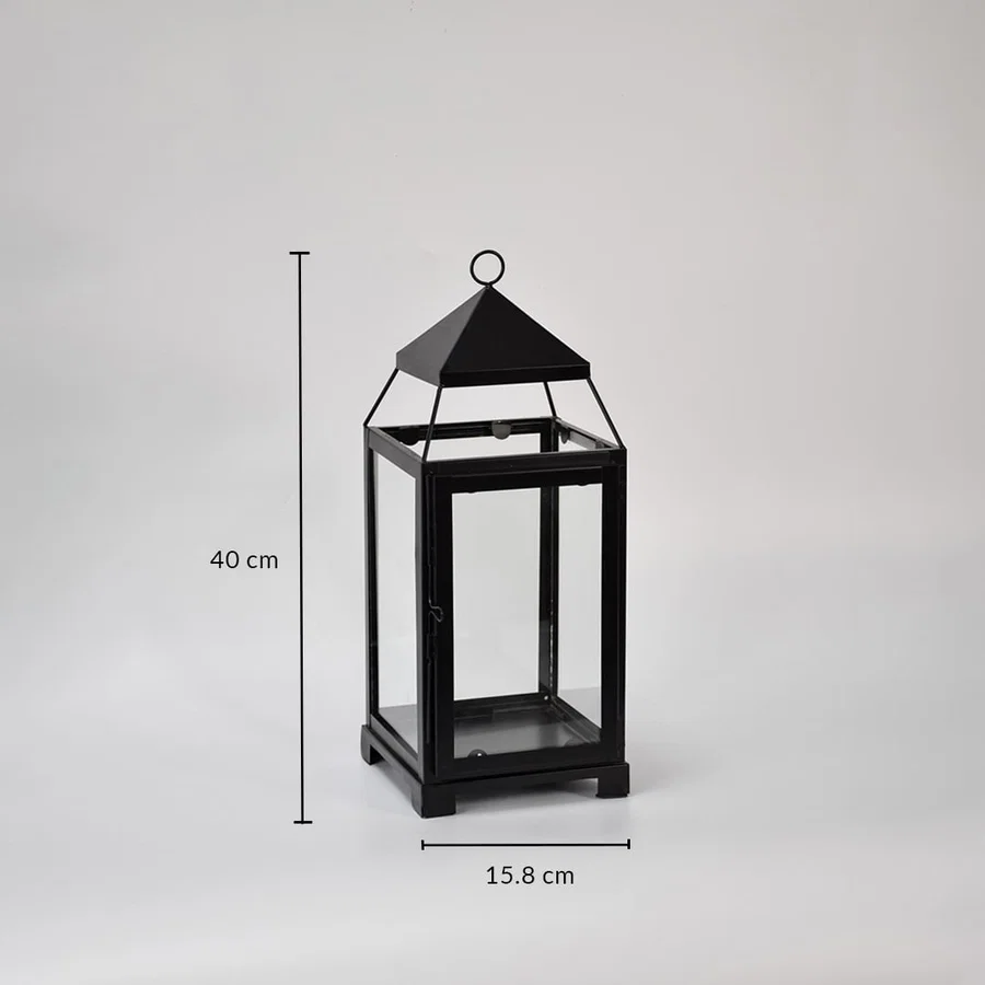 Black metal lantern showing 42 cm height 18 cm width and 18 cm depth dimensions suitable for floor tabletop or porch decor placement.