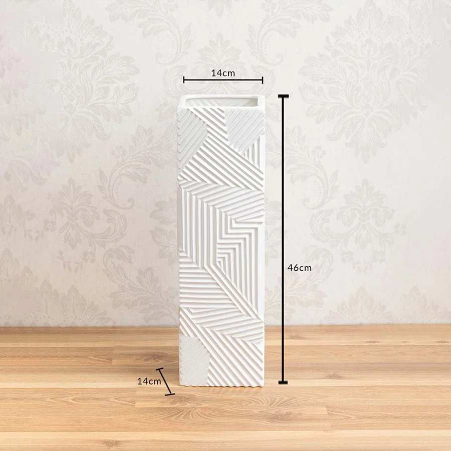 Tall white geometric ceramic vase with 46 cm height and 14 cm width shown on a light background with decorative pattern detailing.