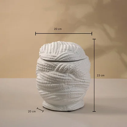 White textured ceramic vase with lid displayed on white background showing height 23 cm and width 20 cm for stylish tabletop decor.