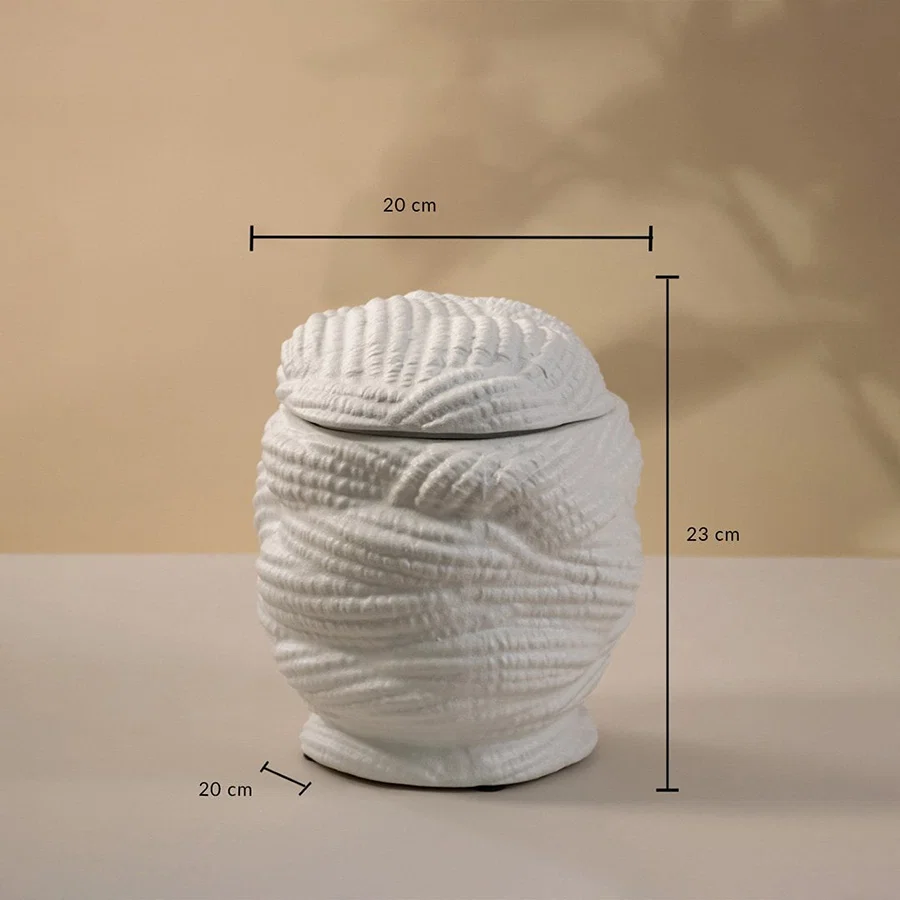 White textured ceramic vase with lid displayed on white background showing height 23 cm and width 20 cm for stylish tabletop decor.