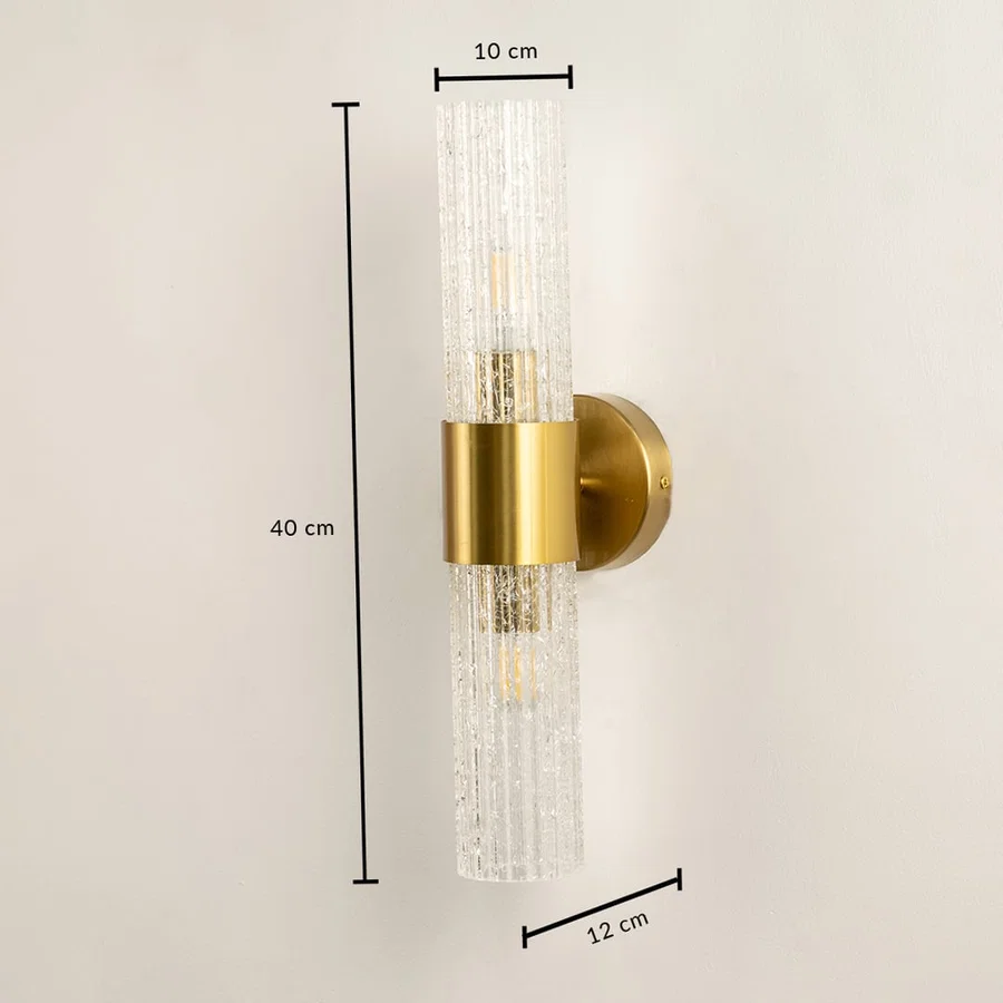 A gold wall light with textured cylindrical glass shades shown with full measurements displaying a height of 40 cm a width of 10 cm and a depth of 12 cm for precise installation.