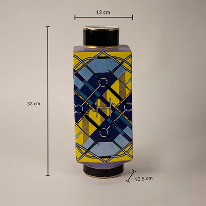 Dimension image ceramic jar vase with geometric blue and yellow design black lid size 33x12x10.5cm home decor piece.