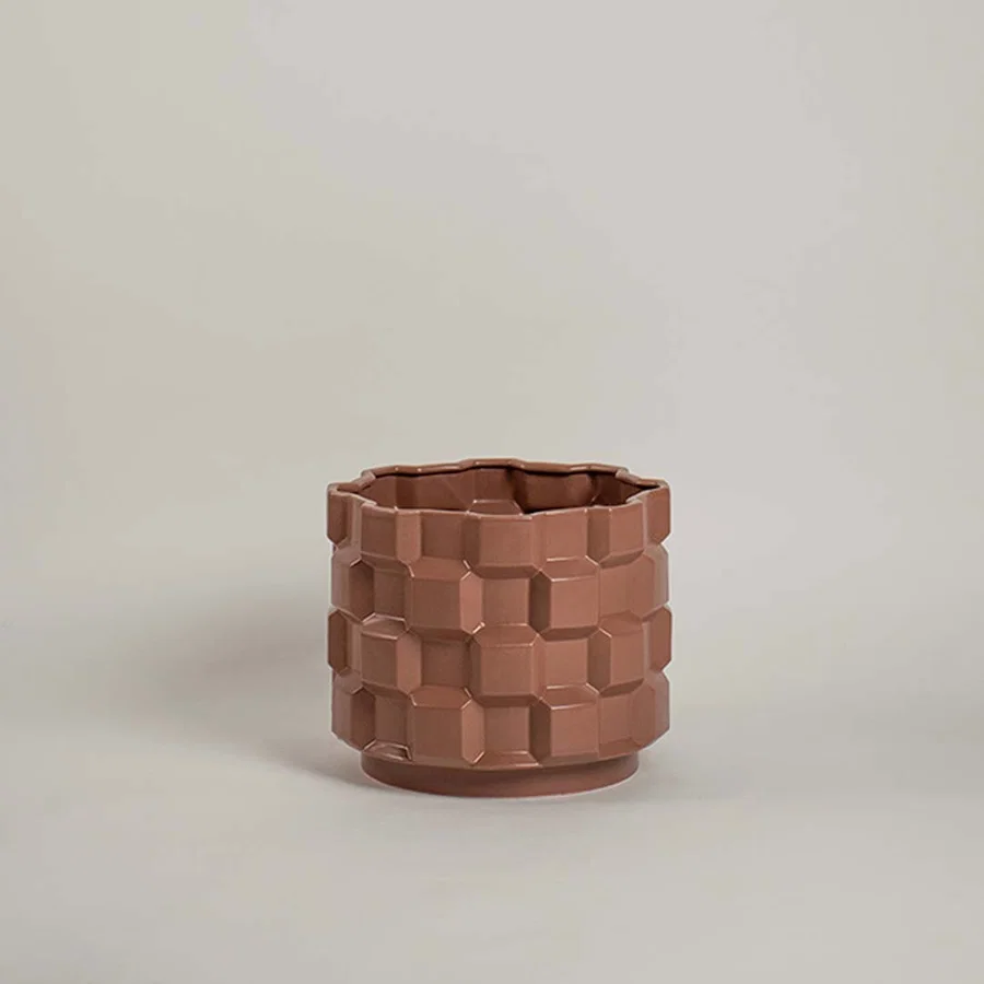Terracotta ceramic woven planter stylish decor piece for console tables and shelves with warm earthy charm accents.