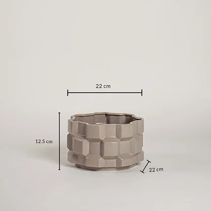 Taupe geometric ceramic planter with height and width measurements shown clearly for easy size understanding.