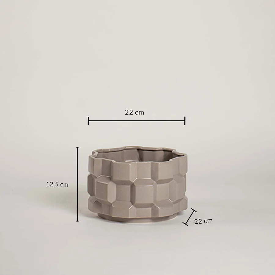 Taupe geometric ceramic planter with height and width measurements shown clearly for easy size understanding.