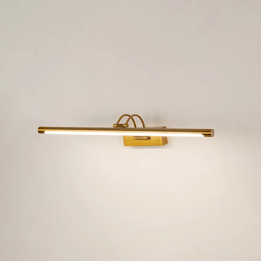 Modern wall light in gold metal finish with linear bar design for bathroom or vanity decor lighting white background.